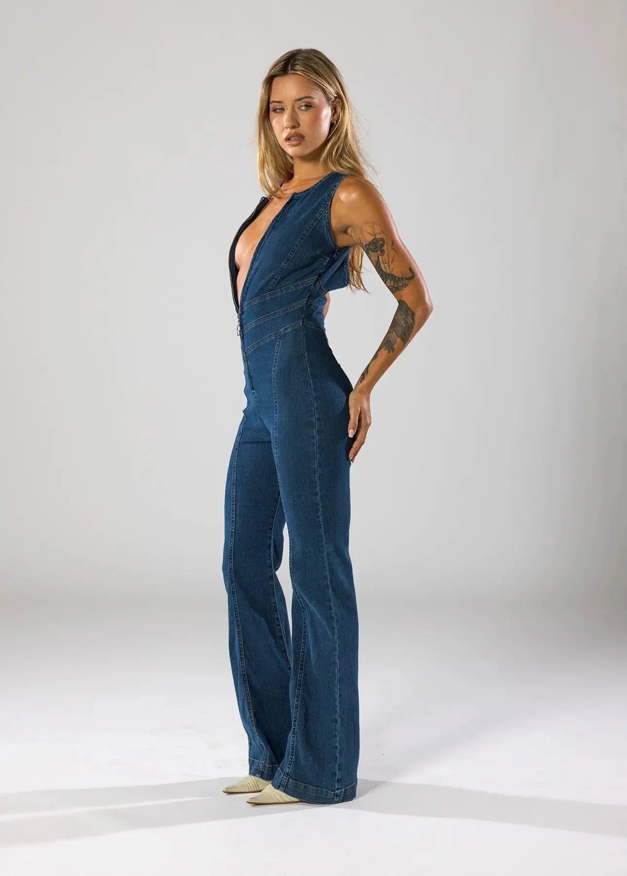 MEWE | Fitted Denim Jumpsuit with Plunge Neck and Flared Legs