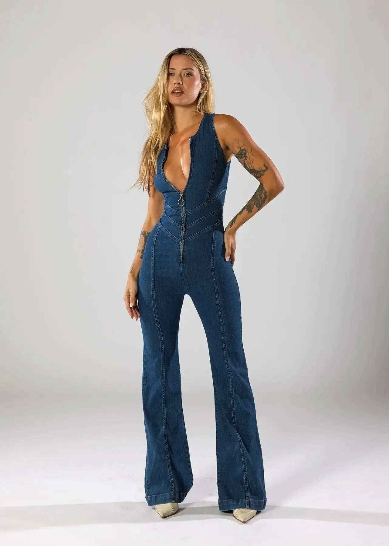 MEWE | Fitted Denim Jumpsuit with Plunge Neck and Flared Legs Mewe London