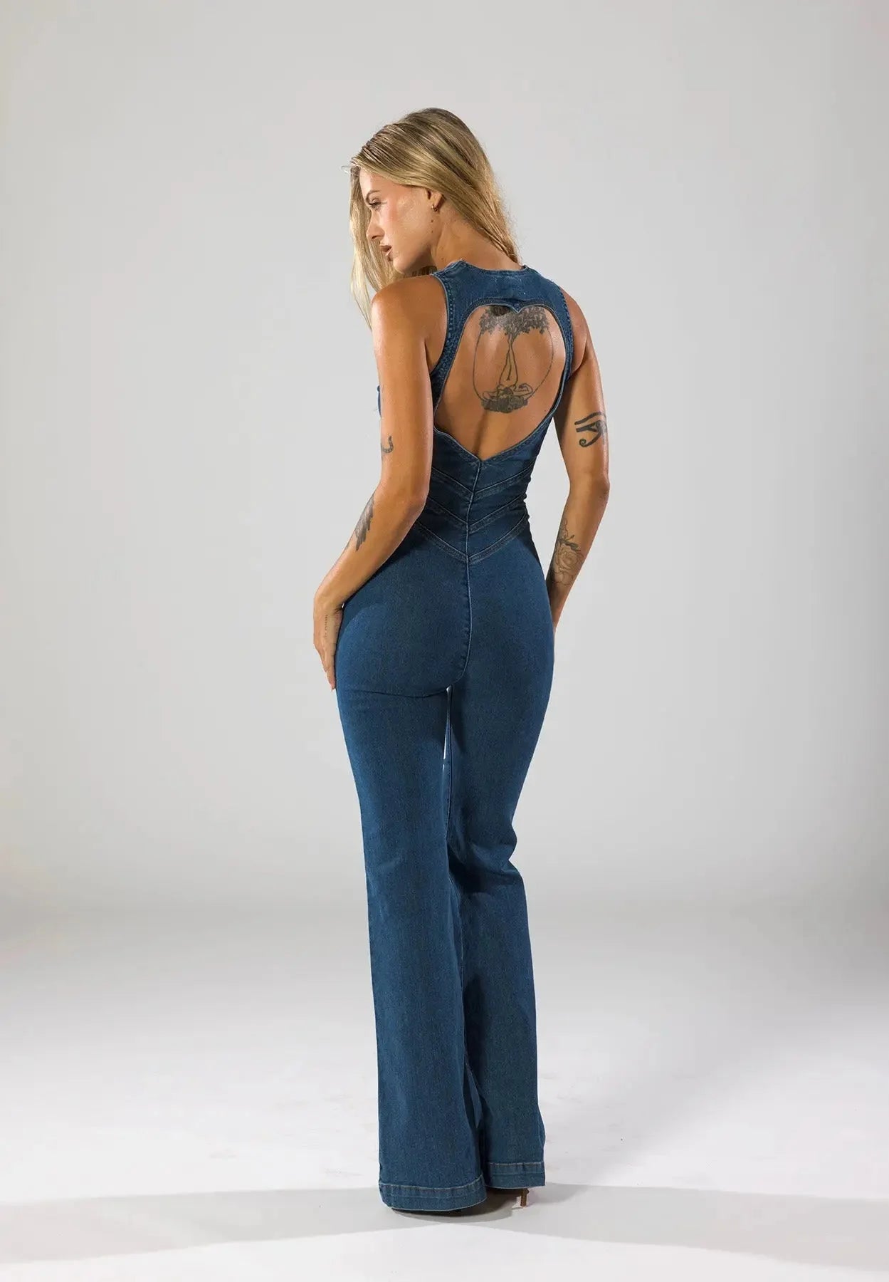 MEWE | Fitted Denim Jumpsuit with Plunge Neck and Flared Legs