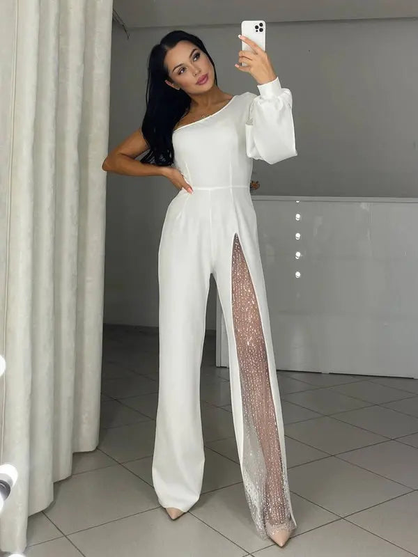 MEWE | One-Shoulder Flare Jumpsuit with Side Slit and Long Sleeves Mewe London