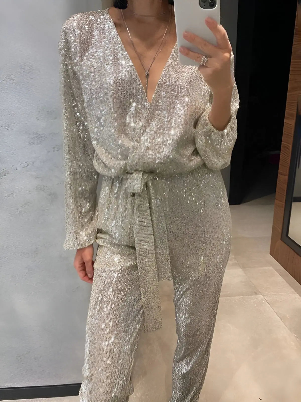 MEWE | Sequin Belt Jumpsuit with V-Neckline and Long Sleeves Mewe London