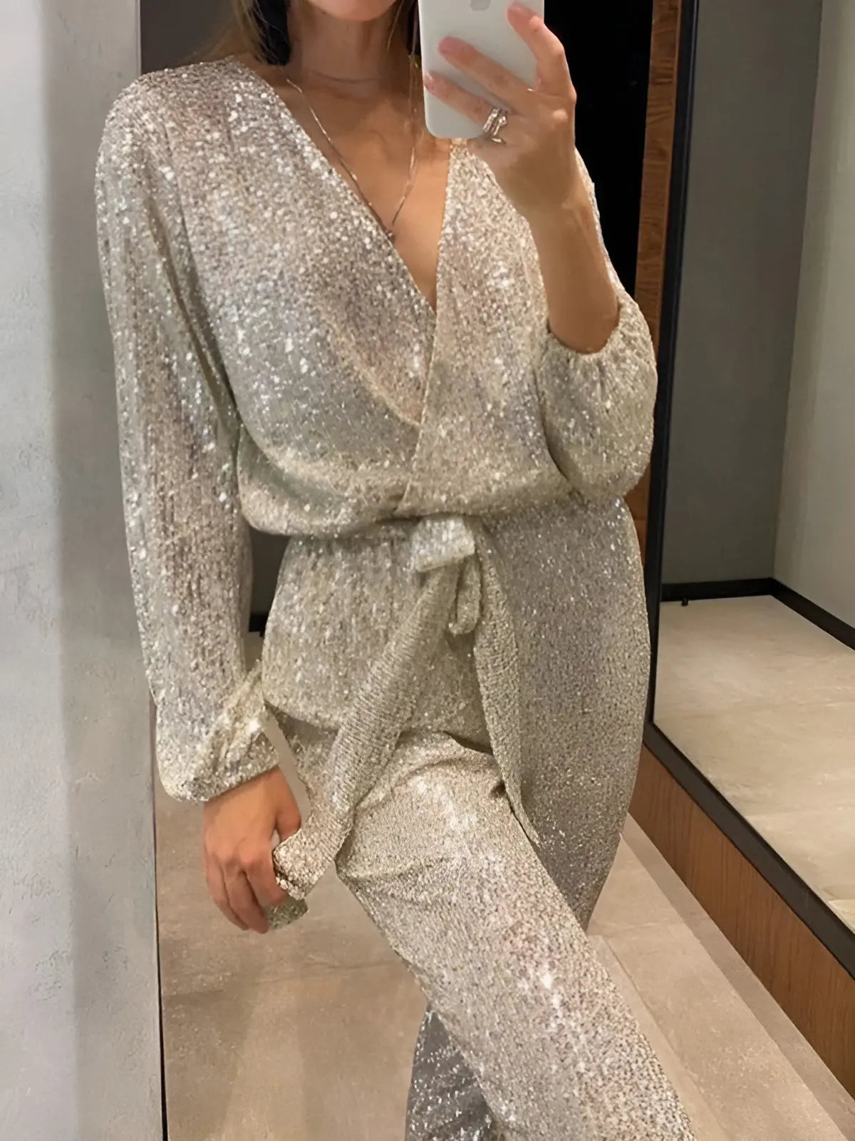 MEWE | Sequin Belt Jumpsuit with V-Neckline and Long Sleeves Mewe London