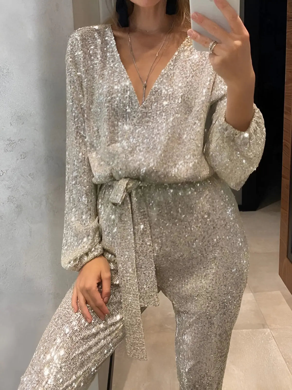 MEWE | Sequin Belt Jumpsuit with V-Neckline and Long Sleeves Mewe London