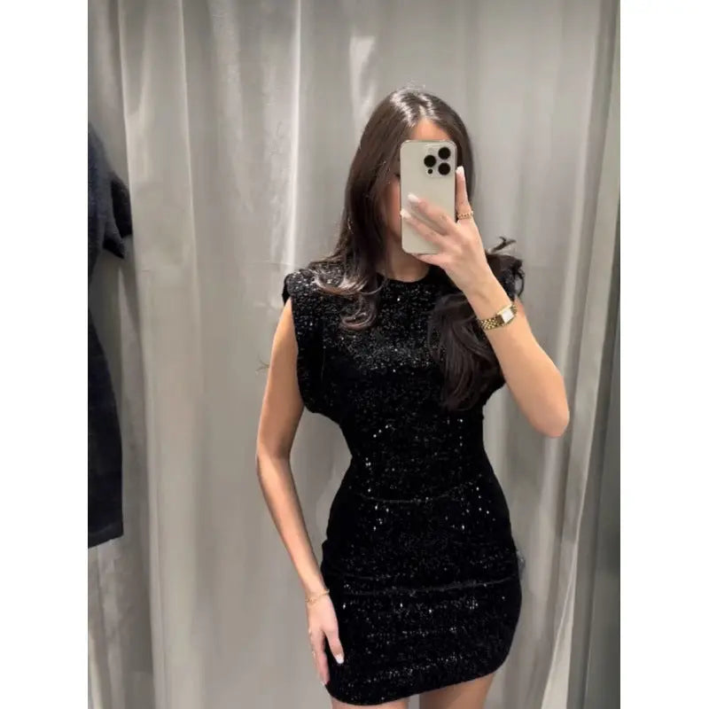 MEWE | Sequin Dress with Shoulder Pads and Back Cutout Mewe London