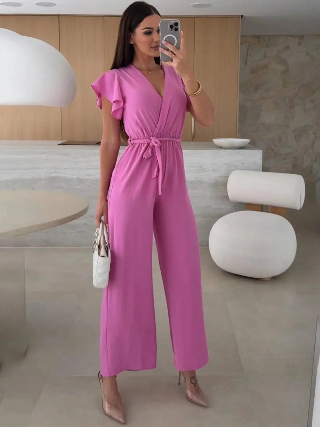 MEWE | Sleeveless V-Neck Jumpsuit with Belt and Wide-Leg Design Mewe London