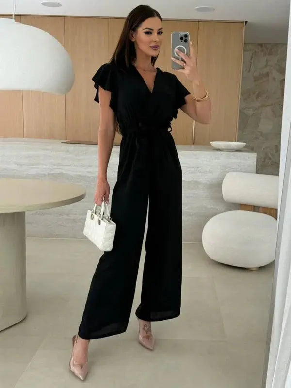 MEWE | Sleeveless V-Neck Jumpsuit with Belt and Wide-Leg Design Mewe London