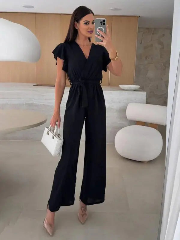 MEWE | Sleeveless V-Neck Jumpsuit with Belt and Wide-Leg Design Mewe London