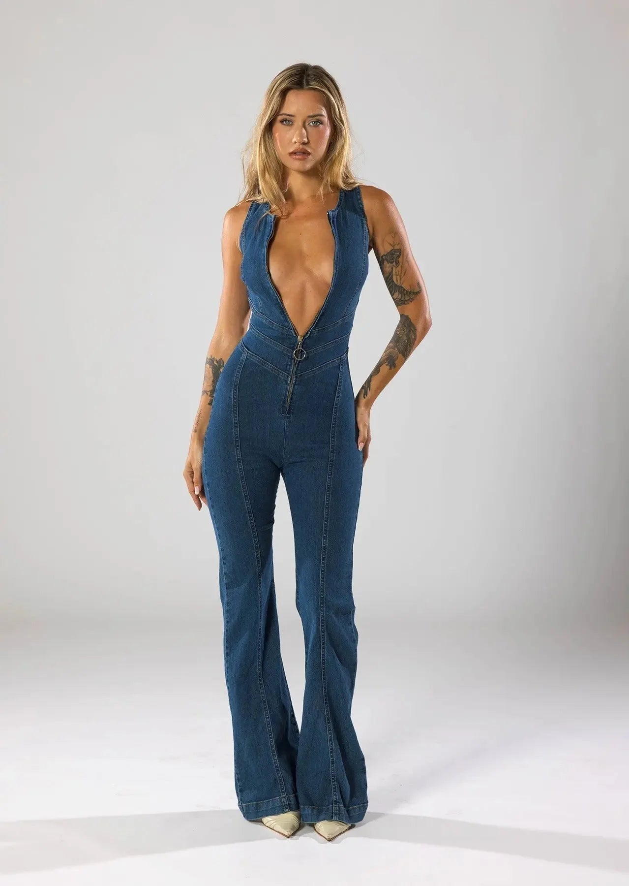 MEWE | Fitted Denim Jumpsuit with Plunge Neck and Flared Legs