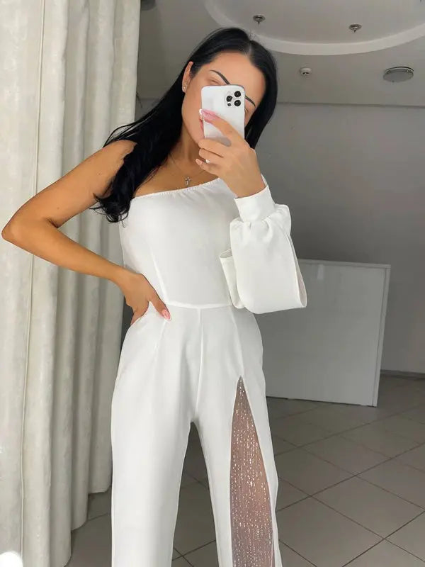 MEWE | One-Shoulder Flare Jumpsuit with Side Slit and Long Sleeves Mewe London