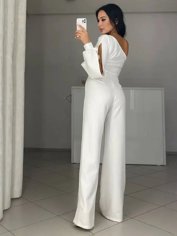 MEWE | One-Shoulder Flare Jumpsuit with Side Slit and Long Sleeves Mewe London
