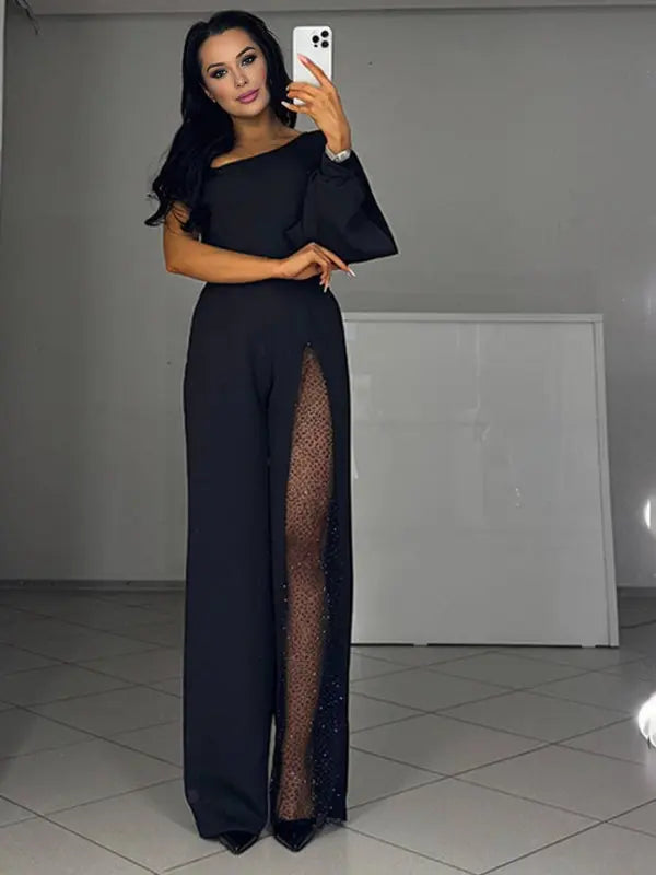 MEWE | One-Shoulder Flare Jumpsuit with Side Slit and Long Sleeves Mewe London