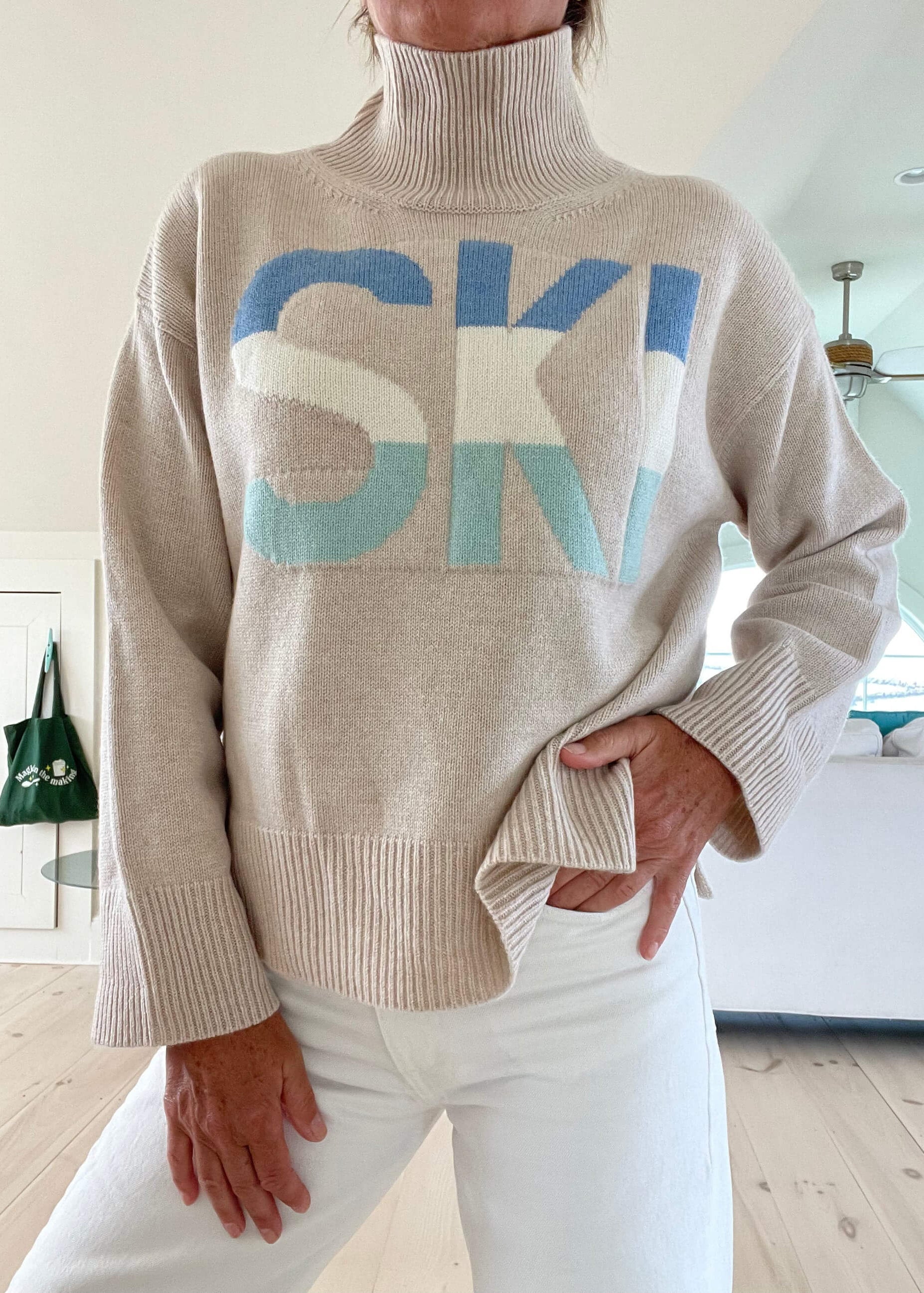 MEWE | Oversized Turtleneck Ski Jumper with Intarsia Graphic and Stripe Sleeves Mewe London