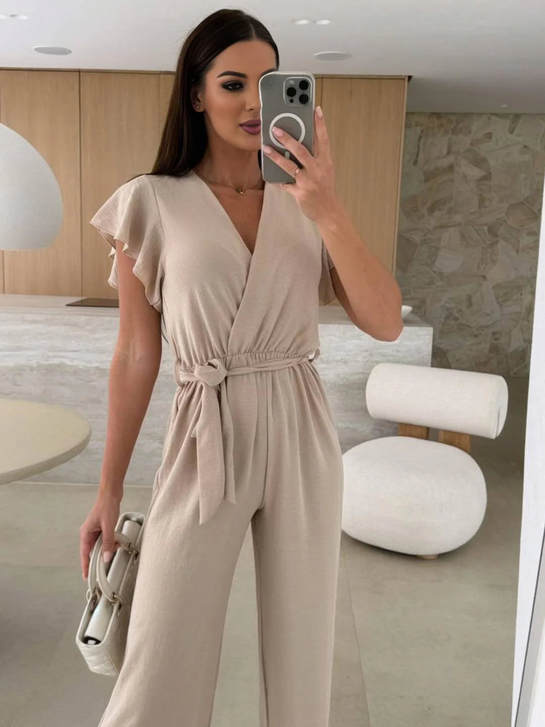 MEWE | Sleeveless V-Neck Jumpsuit with Belt and Wide-Leg Design