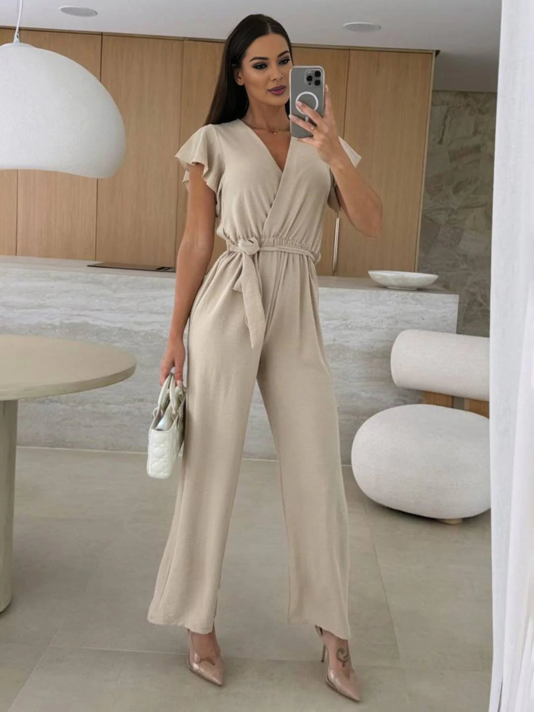MEWE | Sleeveless V-Neck Jumpsuit with Belt and Wide-Leg Design